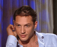 tom hardy wink GIF