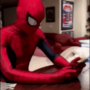 Chaddymoyes spiderman phone spiderman on a phone hiding phone caught on phone GIF