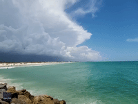 Ominous Storm Clouds Loom Over Florida Beach Amid Weather Warnings