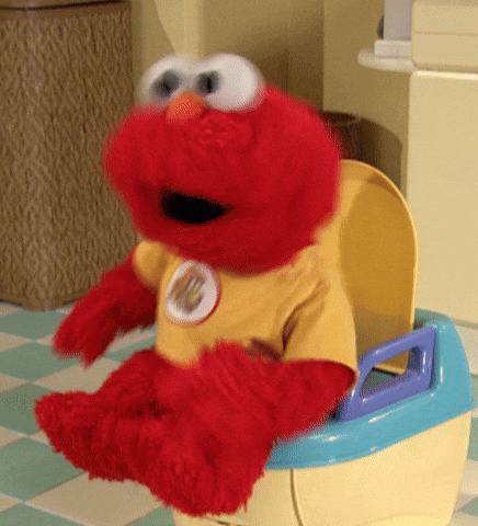 Sesame Street gif. Elmo sitting on a training potty, dancing happily.