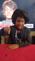 Seven-Year-Old Enthusiastically Portrays Congresswoman Maxine Waters