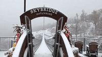 Snow Falls on Suspension Bridge in Tennessee's Great Smoky Mountains