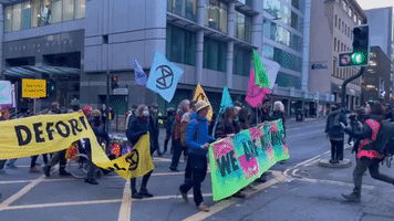 Extinction Rebellion Marches Through Glasgow After Protesting at JP Morgan Building