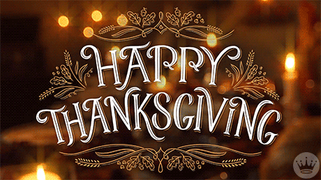 Text gif. Against a short video of softly flickering candles sit the words "Happy Thanksgiving" in an ornate font, surrounded by fall-themed flourishes of oak leaves and acorns.