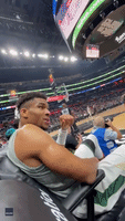 Giannis Antetokounmpo Gives Young Fan His Sleeve