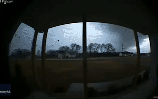 Door Camera Records Funnel Cloud Passing Through Bedford County, Tennessee
