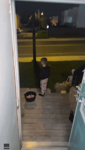 'We Got Candy!' Kid Desperate for Trick-or-Treaters Pleads Down Quiet Newfoundland Street