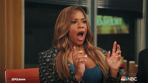 TV gif. Kimrie Lewis as Mika on Kenan looks appalled, with an open mouth, leaning back and blinking and pointing two index fingers at someone.