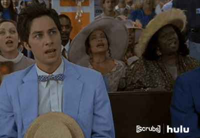 TV gif. Zach Braff as J.D. from Scrubs is sitting in a pew with a blue suit on. He throws his head back and closes his eyes in exultation, saying, "Amen."