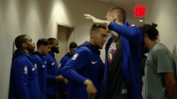 kristaps porzingis player bench GIF by NBA