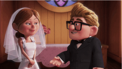 Disney gif. At their wedding in the movie Up, a young Ellie jumps and kisses Carl sweetly.