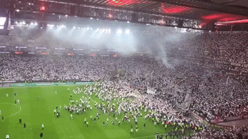 Frankfurt Fans Invade Pitch After Victory