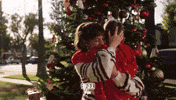christmas tree hug GIF