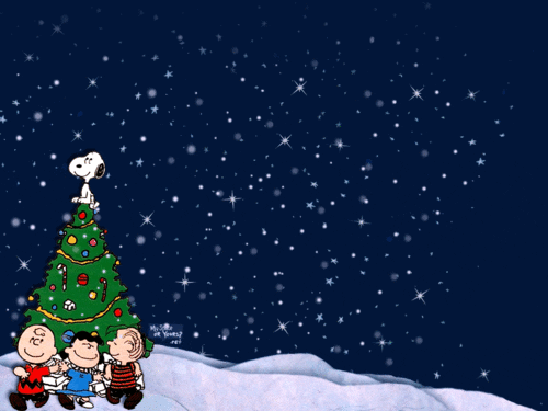 Peanuts gif. Charlie, Lucy, and Linus from A Charlie Brown Christmas sit in a corner with a Christmas tree with Snoopy as the star on top as snow moves and sparkles around them.