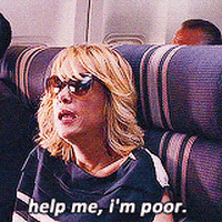 Movie gif. Kristen Wiig as Annie from Bridesmaids sits on a plane wearing sunglasses. She looks up at someone in the aisle and says, "Help me, I'm poor."