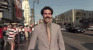happy sacha baron cohen GIF