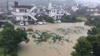 Flooding Rain Inundates Streets With Water in Okinawa, Japan