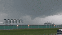 Twister Destroys Building Right in Front of Chasers Amid Deadly Iowa Storms
