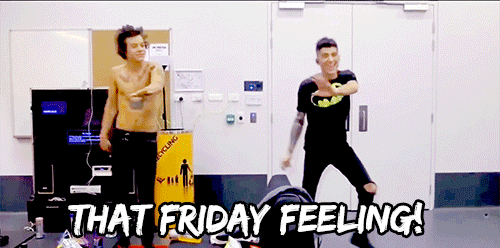 Celebrity gif. Harry Styles and Zayn Malik dance in coordination, hopping left and right while spreading their arms left and right. Text, "That Friday feeling!"