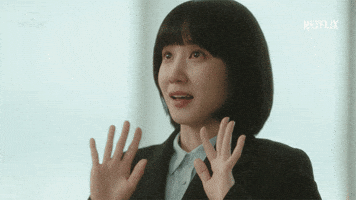 TV gif. Park Eun-bin as Woo Youngwoo on Extraordinary Attorney Woo looks up with amazement in her eyes holding her hands up and spreading her fingers out as she processes what she’s looking at.