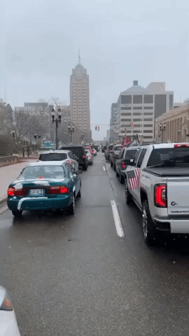 Protesters Calling for End to Stay-at-Home Order Bring Traffic to a Standstill in Michigan