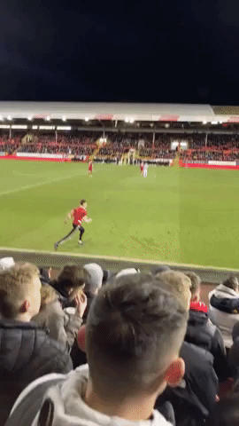 Selfie-Seeking Soccer Fan Runs Onto Pitch in Aberdeen