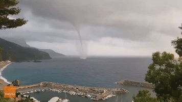 Waterspouts Sweep Over Bay in Southern Italy
