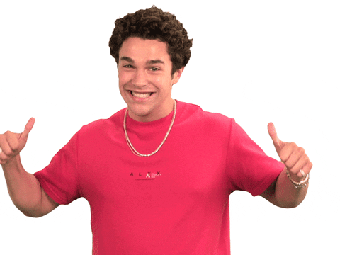 Celebrity gif. With a big smile, Austin Mahone gives two enthusiastic thumbs up.