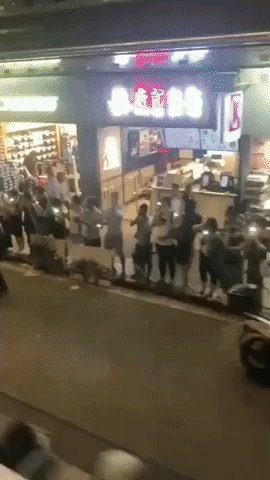 Tram Riders Get Bird's-Eye View of Hong Kong Human Chain