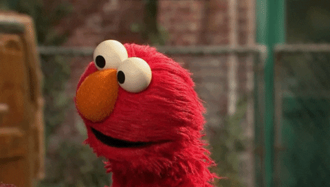 Sesame Street gif. Interested Elmo cocks his head and asks, “Really?”