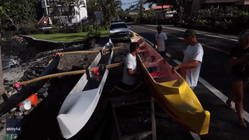 'Canoe Surfing' Group Catch Some Waves Off Hawaiian Coastline