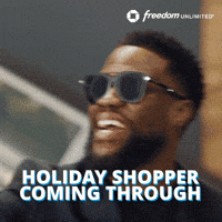 Sponsored gif. Comedian Kevin Hart mouths the words "Anything's Cashbackable" while surrounded by Christmas decor. The Chase Freedom Unlimited logo is in the upper right corner. 