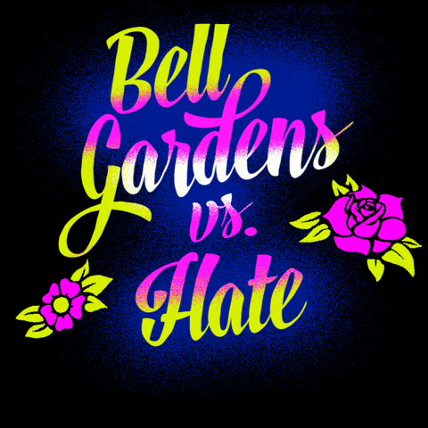 Text gif. Graphic graffiti-style painting of feminine script font and stenciled tattoo flowers, all in neon pink and chartreuse, text reading, "Bell Gardens vs hate," then hate is sprayed over with the message, "Call 211, to report hate."