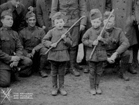 NationalWWIMuseum black and white military footage chewing gum GIF