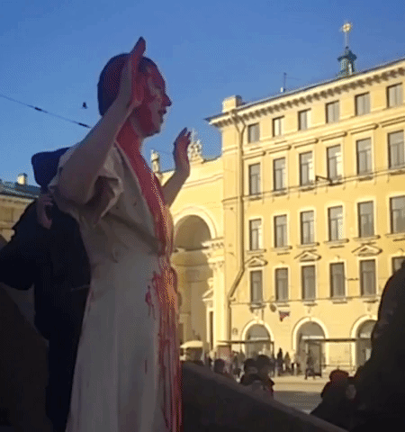 St. Petersburg Artist Covers Herself in Fake Blood