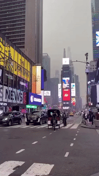Times Square Shrouded in Smoke Haze Caused by Canadian Wildfires