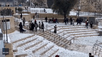 Jerusalem Resident Sleds Down Stairs in Front of Damascus Gate