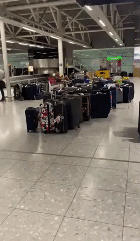 Luggage Piles Up at Heathrow Airport