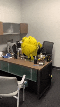Wu_Shock sad office desk headshake GIF