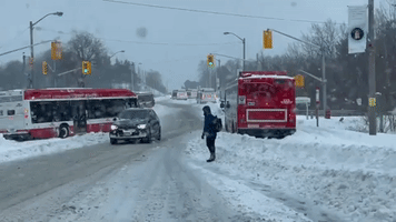 Stuck Buses Line Snowy Toronto Street