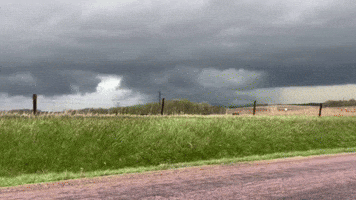 Swirling Mass of Clouds as 'Wedge' Tornado Rips Through Iowa Town