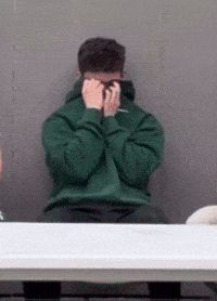 qhuyser laughing crying embarrased trying not to laugh GIF