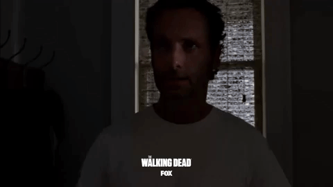 staring the walking dead GIF