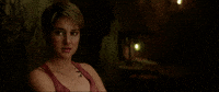 Movie gif. Shailene Woodley as Tris in Divergent blinks in annoyance and turns to face away.