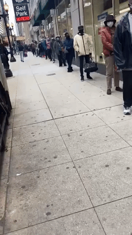 Chicago Residents Line the Block Outside First Early Voting Location