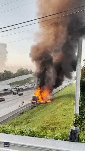 Tour Bus Blaze Shuts Down Major Highway Northwest of Atlanta