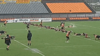 Wests Tigers Players Slip and Slide at Training During Sydney Drenching