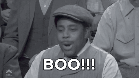 SNL gif. Black and white. Kenan Thompson, wearing a pageboy hat and old-timey clothes, yells, "Boo!!!"