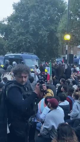 Iran Protesters Gather Outside London Islamic Center