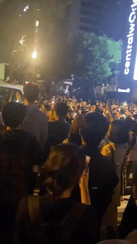 Protesters Surround Thai Police Truck in Bangkok